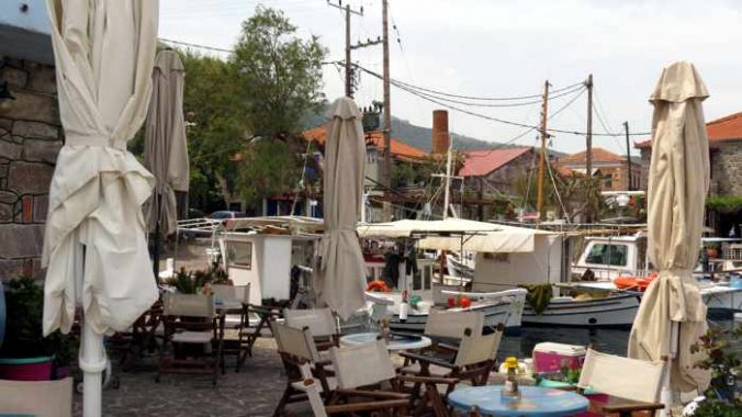 cafe tables on the harbourside at Skala Sykaminias on Lesvos