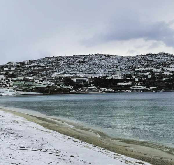 @katerina_brb Instagram photo of snow on Ornos beach on Mykonos