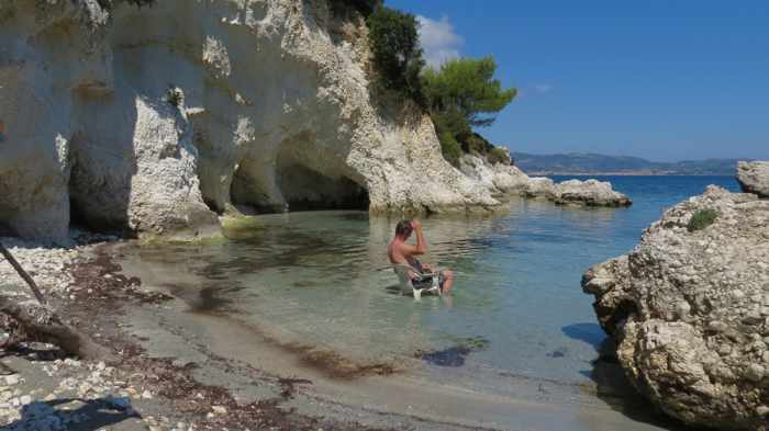 man in the water at Kalamia beach on Kefalonia