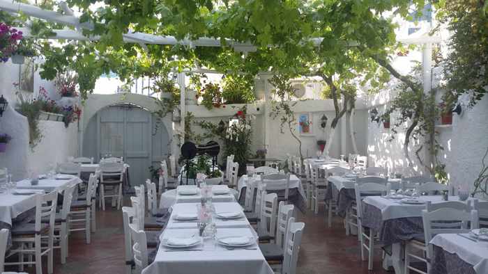 the courtyard dining patio at Eva's Garden Restaurant on Mykonos