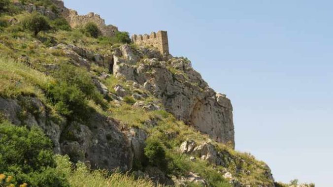 Acrocorinth Castle walls atop a cliff